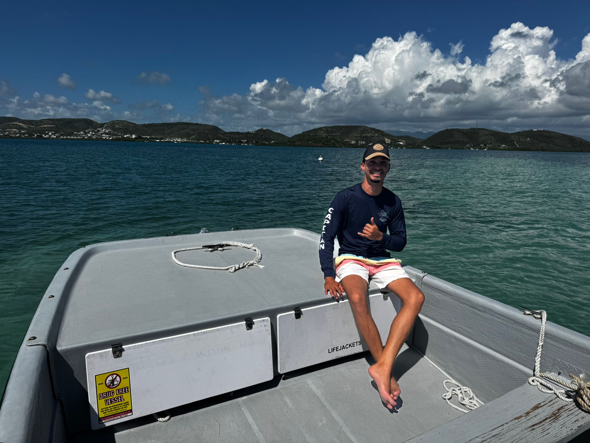 Captain Orlando Espinosa sitting on a boat in La Parguera, Puerto Rico